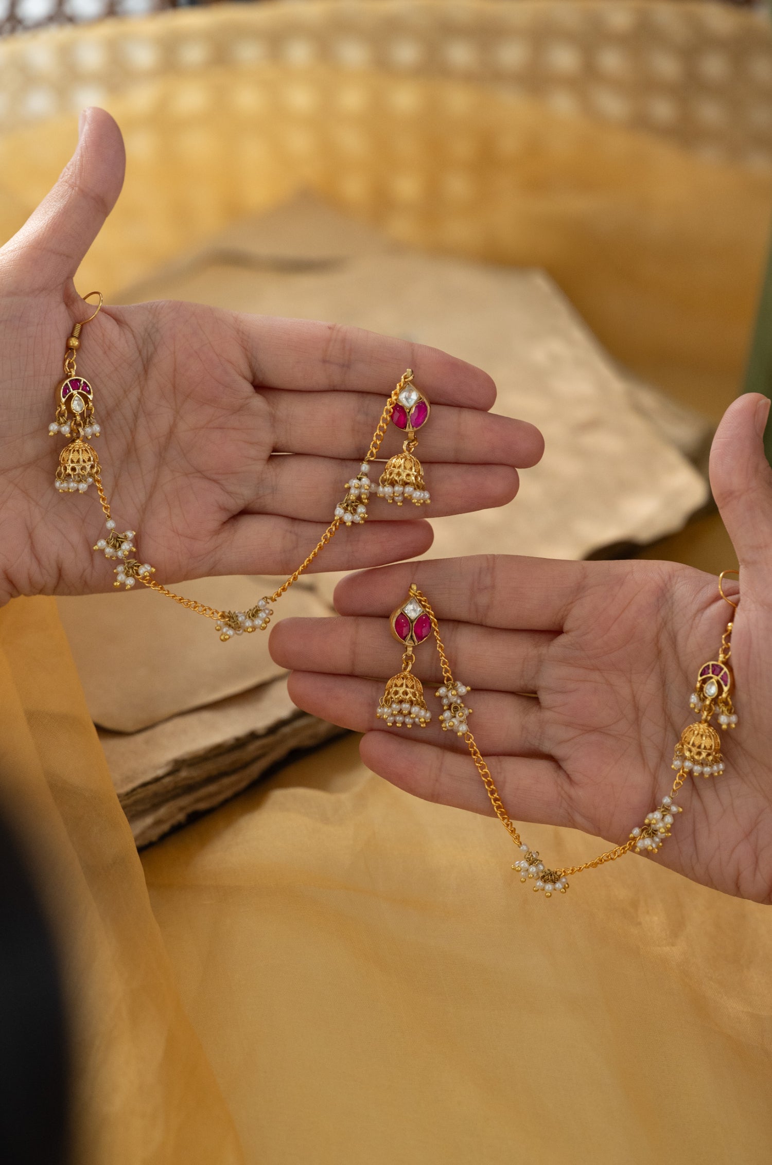 Hira Red Jhumka Earrings